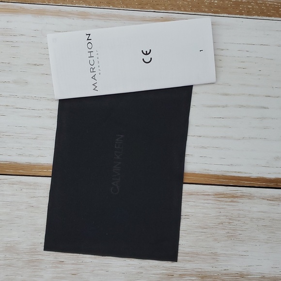 Calvin KLIEN Aviator Sunglasses with Silver Frame and Purple Lenses - Picture 7 of 8